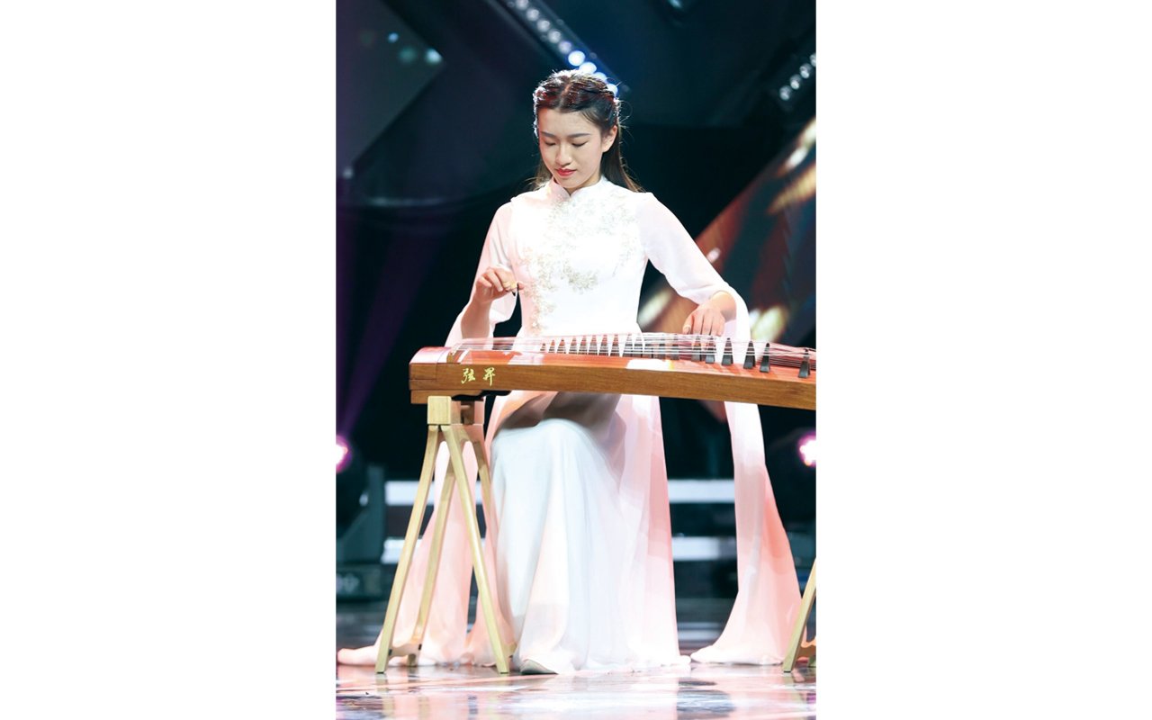 Arrange for students to participate in a performance at a charity luncheon