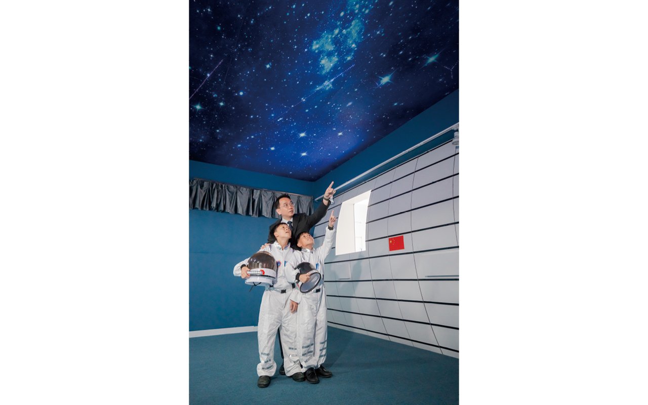 There is a simulated space capsule in the astronomy room