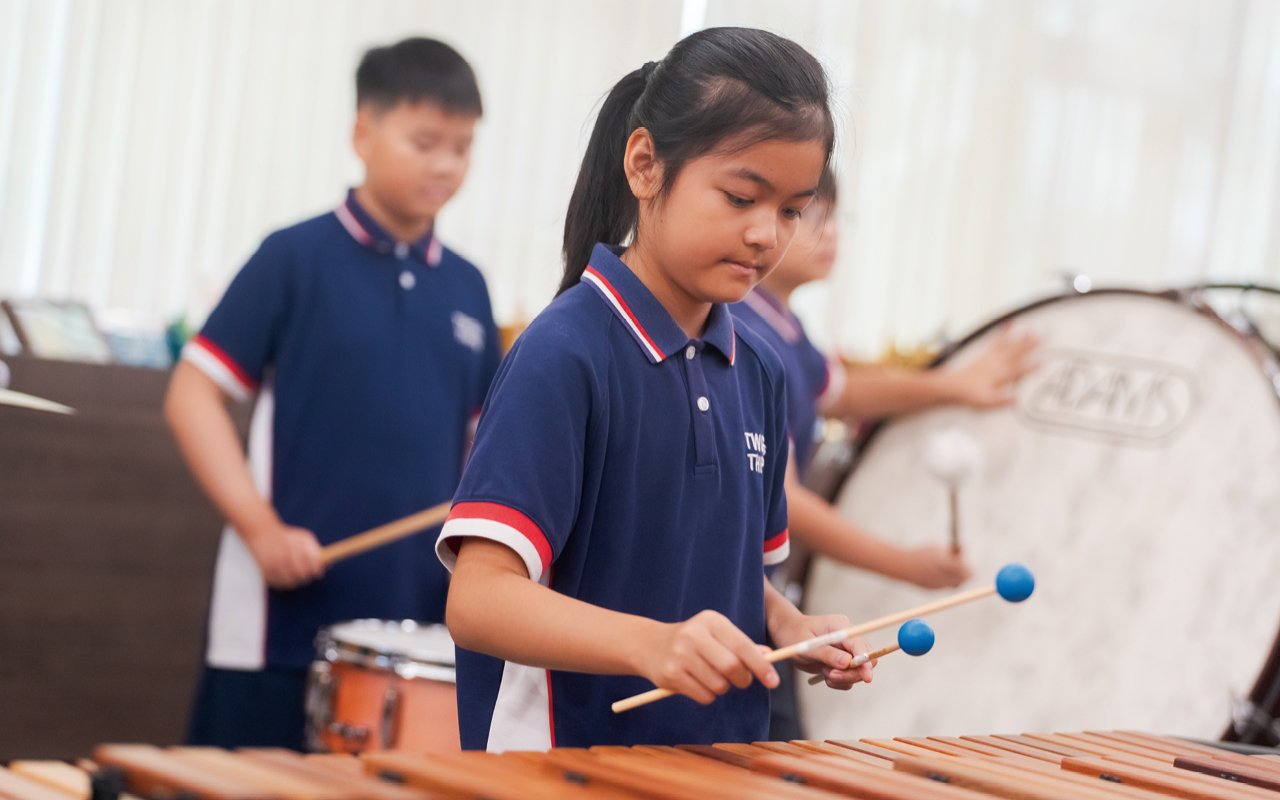 The school has a choir, a percussion band and a wind band.